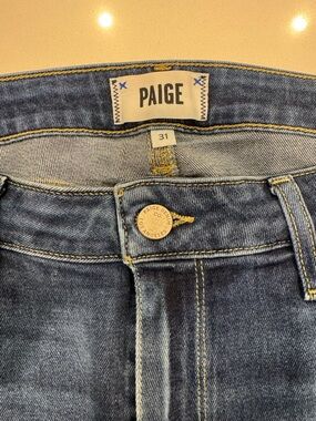 PAIGE women High rise skinny ankle jeans in medium blue wash with raw hem.